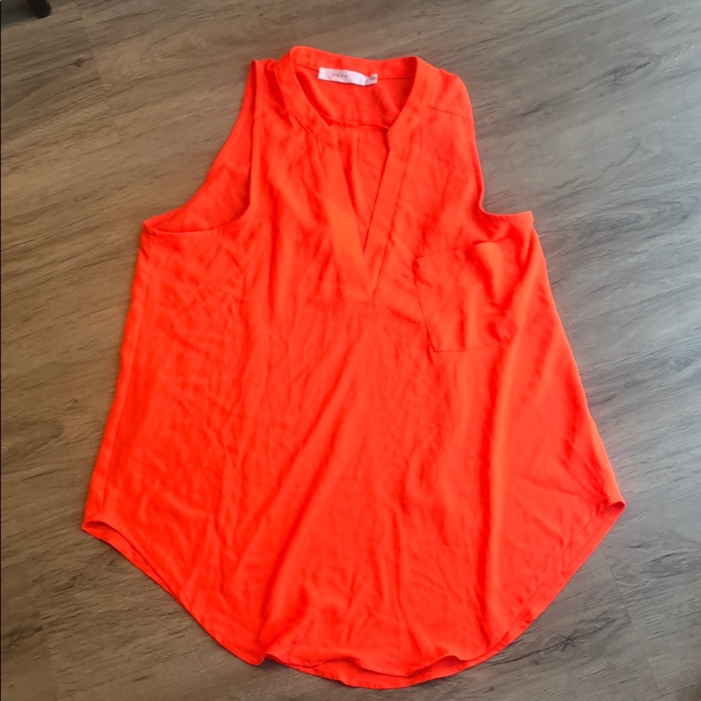 Bright colored v-neck sleeveless shirt